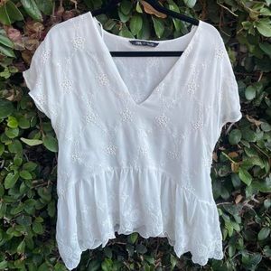 Blouse is a bit torn as shown on the third photo! But still in great condition.